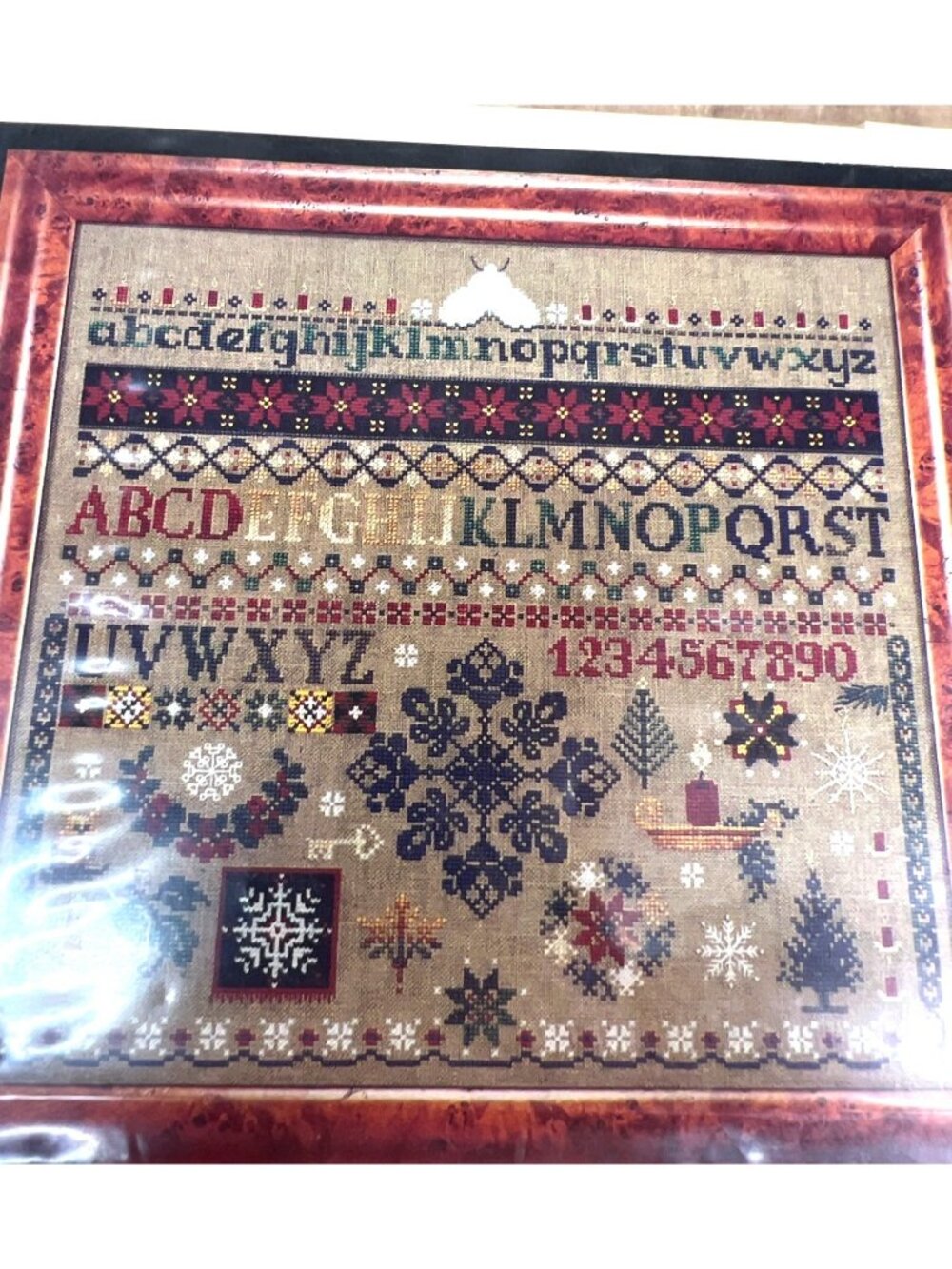 Christmas-Themed Cross-Stitch Pattern Alphabet & Holiday Designs